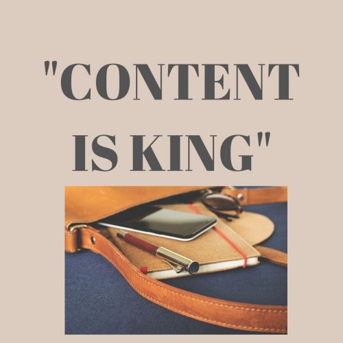 content is king- written above a notepad